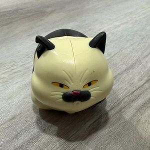 McDonald’s Happy Meal toy from 2021 featuring Machiavelli the cat from Disney